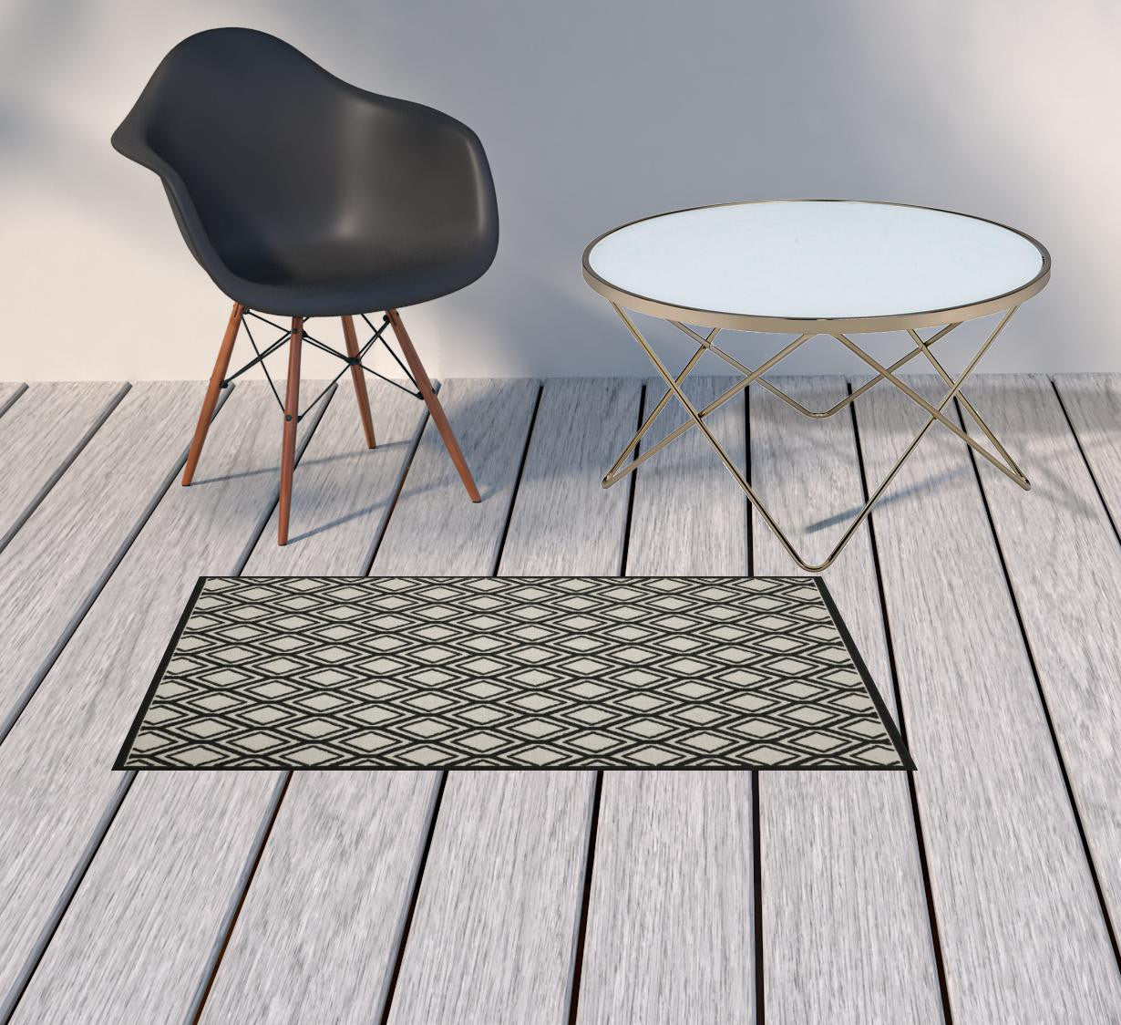 2' X 4' Beige and Black Geometric Stain Resistant Indoor Outdoor Area Rug