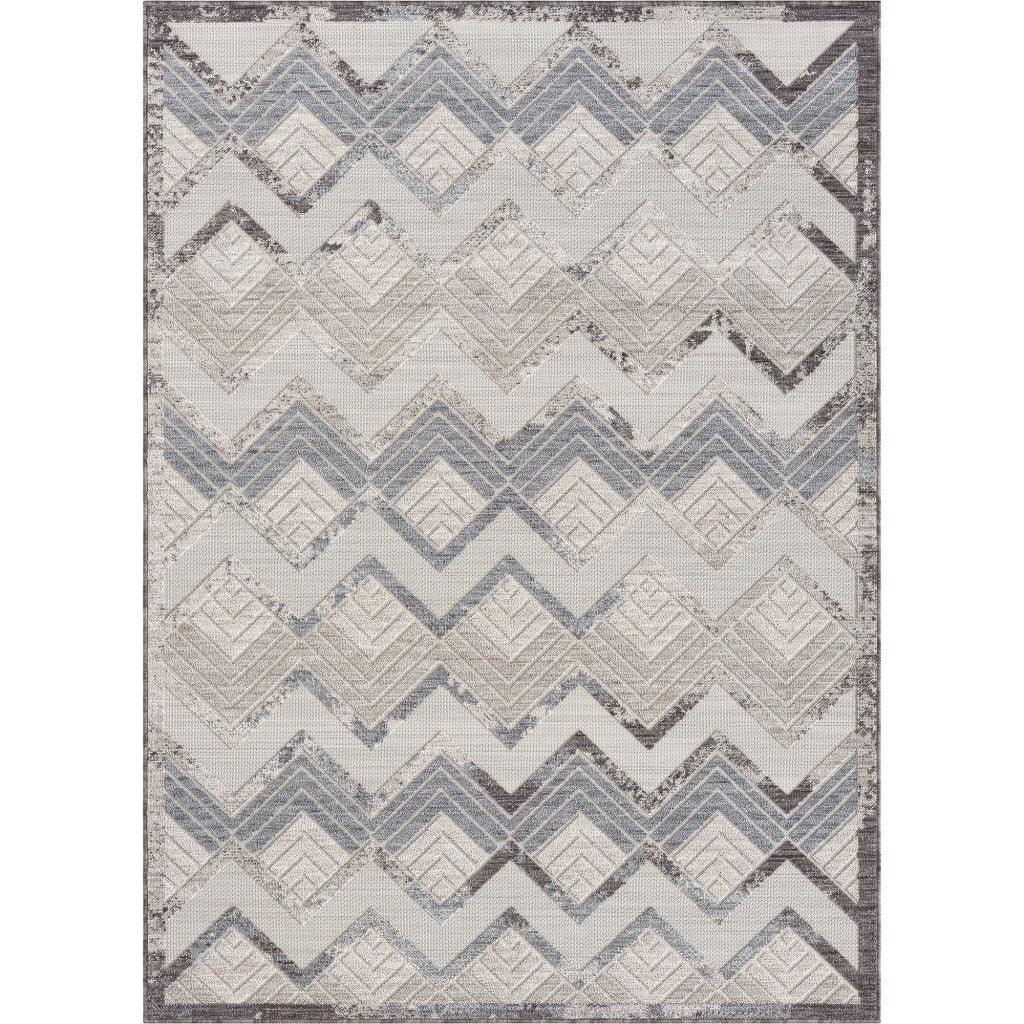 5' X 7' Blue And Ivory Chevron Indoor Outdoor Area Rug