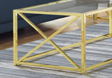 44" Clear And Gold Glass And Iron Coffee Table