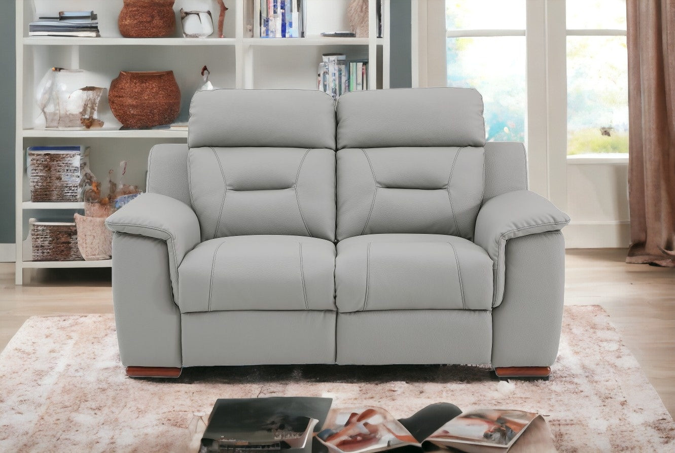 67" Gray And Brown Faux Leather Manual Reclining Love Seat