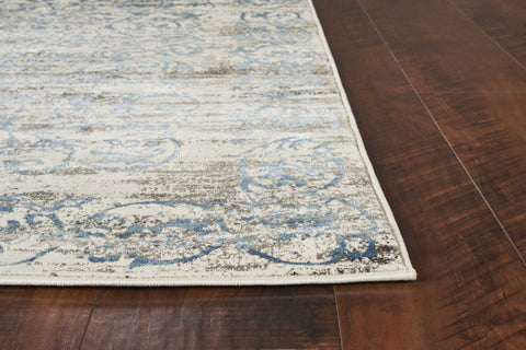 10'X13' Ivory Blue Machine Woven Distressed Floral Indoor Area Rug