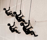 Set of Four 6" Black Resin Unique Climbing Men Wall Decor