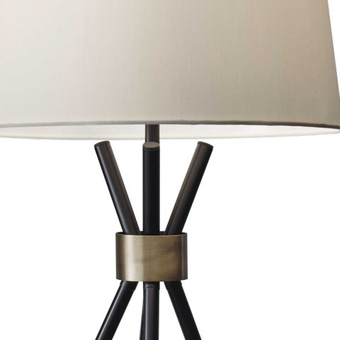 Black Metal Tripod Leg With Antique Brass Accent Table Lamp