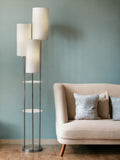 68" Steel Three Light Floor Lamp With White Linen Cylinder Shades