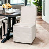 Beige And Brown Slipcovered Wood Parsons chair