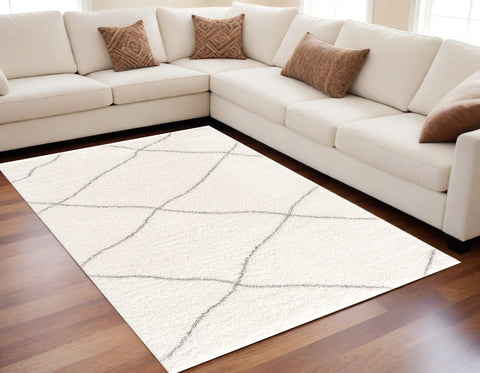 5’ X 8’ Ivory Modern Uneven Lattice Area Rug
