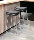 Set of Two 32" Black And Silver Faux Leather And Steel Backless Bar Height Bar Chairs