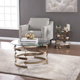 32" Champagne Glass And Metal Round Coffee Table