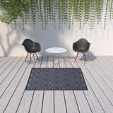 5' X 7' Navy Blue Argyle Indoor Outdoor Area Rug