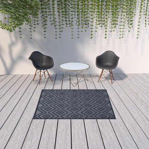 5' X 7' Navy Blue Argyle Indoor Outdoor Area Rug