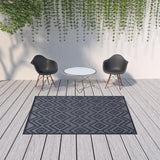 6' X 9' Navy Blue Argyle Indoor Outdoor Area Rug