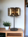 30" Bronze Metal Four Light Cylinder Bedside Table Lamp With Amber Round Shade