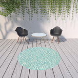 8' x 8' Blue and Ivory Round Floral Stain Resistant Indoor Outdoor Area Rug