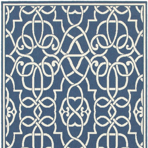 9' X 13' Blue and Ivory Geometric Stain Resistant Indoor Outdoor Area Rug