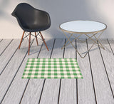 2' x 3' Green and Ivory Geometric Stain Resistant Indoor Outdoor Area Rug