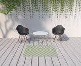 4' x 6' Blue and Green Geometric Stain Resistant Indoor Outdoor Area Rug