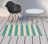 2' X 4' Blue and Ivory Geometric Stain Resistant Indoor Outdoor Area Rug