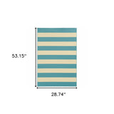 2' X 4' Blue and Ivory Geometric Stain Resistant Indoor Outdoor Area Rug