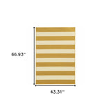 4' x 6' Gold and Ivory Geometric Stain Resistant Indoor Outdoor Area Rug
