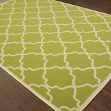 5' x 8' Green and Ivory Geometric Stain Resistant Indoor Outdoor Area Rug