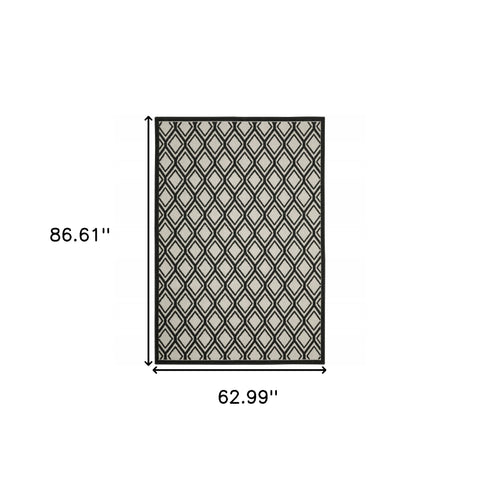 5' x 7' Beige and Black Geometric Stain Resistant Indoor Outdoor Area Rug