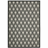 5' x 7' Beige and Black Geometric Stain Resistant Indoor Outdoor Area Rug