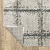 5' X 8' Grey Teal And Beige Geometric Power Loom Stain Resistant Area Rug