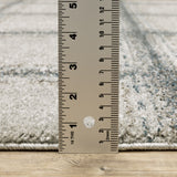 5' X 8' Grey Teal And Beige Geometric Power Loom Stain Resistant Area Rug