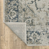 6' X 9' Grey Blue And Teal Oriental Power Loom Stain Resistant Area Rug