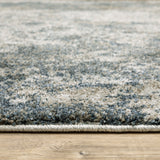 6' X 9' Teal Grey Tan And Beige Abstract Power Loom Stain Resistant Area Rug