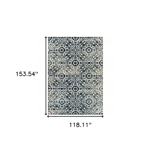 10' X 13' Navy And Ivory Geometric Power Loom Stain Resistant Area Rug