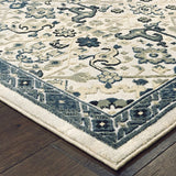 4' X 6' Ivory Navy And Gold Oriental Power Loom Stain Resistant Area Rug