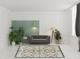 8' X 11' Ivory Navy And Gold Oriental Power Loom Stain Resistant Area Rug