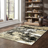 4' X 6' Black Gold Grey And Ivory Abstract Power Loom Stain Resistant Area Rug