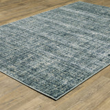 5' X 7' Dark Blue Light Blue Grey Ivory And Beige Abstract Power Loom Stain Resistant Area Rug