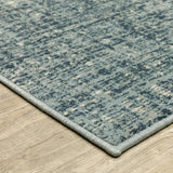 6' X 9' Dark Blue Light Blue Grey Ivory And Beige Abstract Power Loom Stain Resistant Area Rug