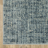 6' X 9' Dark Blue Light Blue Grey Ivory And Beige Abstract Power Loom Stain Resistant Area Rug