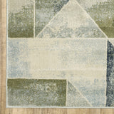 5' X 7' Blue Green Grey Gold And Ivory Geometric Power Loom Stain Resistant Area Rug