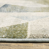 10' X 13' Blue Green Grey Gold And Ivory Geometric Power Loom Stain Resistant Area Rug