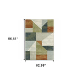 5' X 7' Grey Teal Blue Rust Green And Ivory Geometric Power Loom Stain Resistant Area Rug