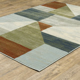 6' X 9' Grey Teal Blue Rust Green And Ivory Geometric Power Loom Stain Resistant Area Rug