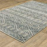 6' X 9' Blue And Beige Geometric Power Loom Stain Resistant Area Rug