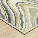 6' X 9' Ivory Blue And Beige Abstract Power Loom Stain Resistant Area Rug