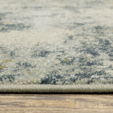 8' X 10' Beige Teal Grey And Gold Abstract Power Loom Stain Resistant Area Rug