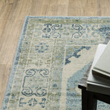 5' X 7' Blue Grey Beige And Teal Oriental Power Loom Stain Resistant Area Rug