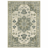 3' X 5' Ivory Blue Teal Grey And Olive Green Oriental Power Loom Stain Resistant Area Rug