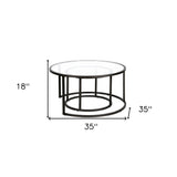 Set of Two 35" Black Glass And Steel Round Nested Coffee Tables