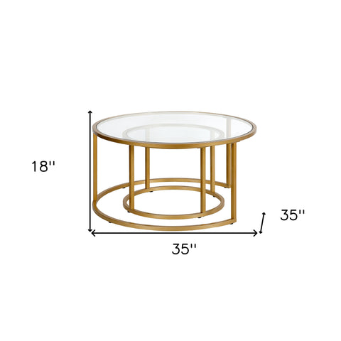 Set of Two 35" Gold Glass And Steel Round Nested Coffee Tables