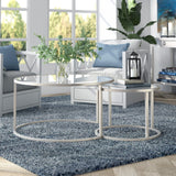 Set of Two 35" Silver Glass And Steel Round Nested Coffee Tables