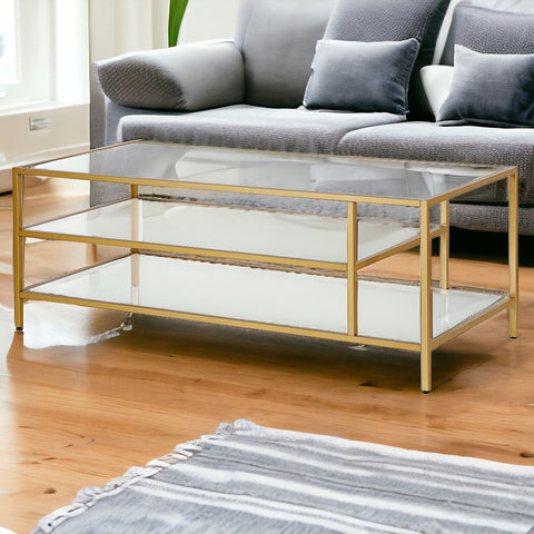 46" Gold Glass And Steel Coffee Table With Two Shelves